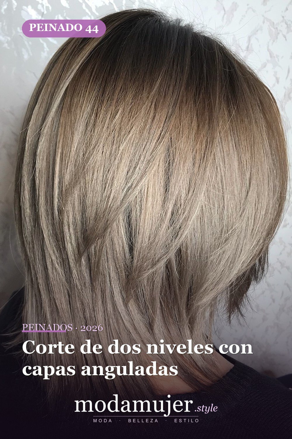 Corte de dos niveles con capas anguladas — 50 cortes de pelo medianos para mujeres que serán enormes en 2026